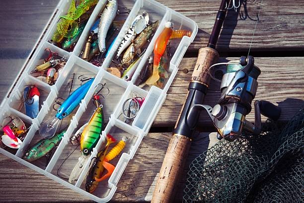 Caja con accesorios de pesca